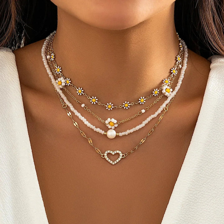 Damen Boho Gänseblümchen Halsketten-Set aus Edelstahl mit Perlen, ideal für frühlingshaften Lagenlook.