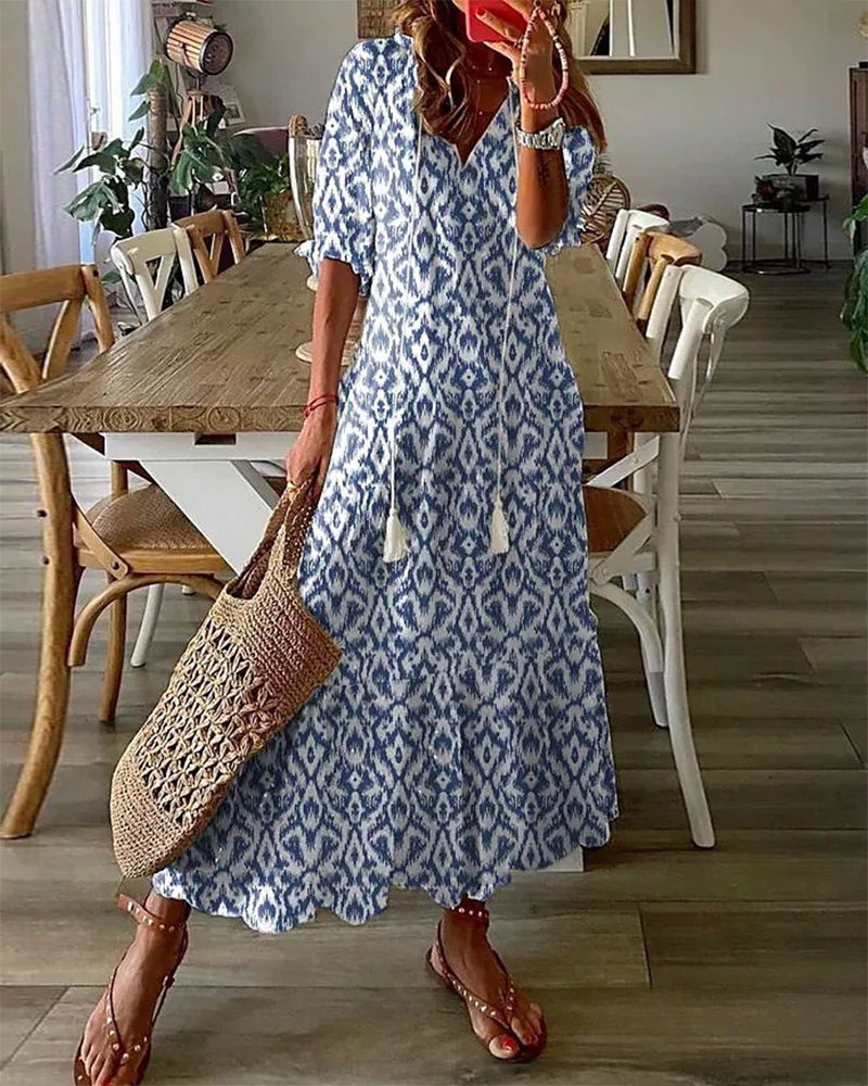 Damen Boho Vintage Sommer Maxikleid mit V-Ausschnitt, ideal als luftiges Freizeitkleid.