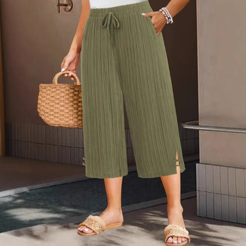 Komfortable weite Capri-Hose für Damen. Elastische Taille & praktische Taschen. Ideal als Sommer-Freizeithose.