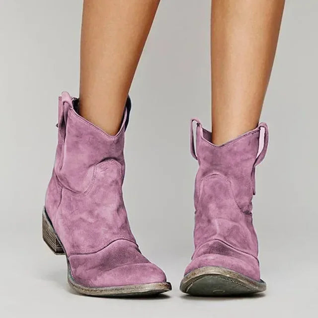Damen Modestiefel im Vintage Western-Look. Komfortable Cowboystiefel mit rutschfester Profilsohle für festen Halt.