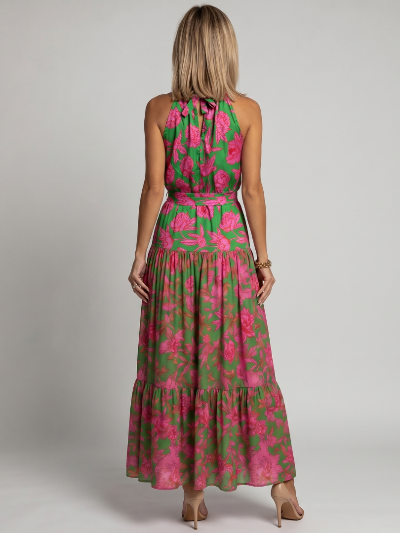 Modisches Damen Midikleid mit floralem Print, drapierter Silhouette und Halterkragen.