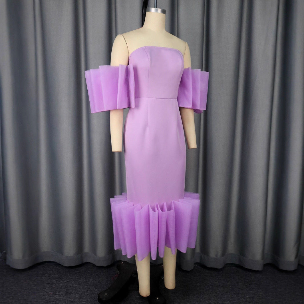 Frauen Sommerkleid: Schickes Midi-Kleid mit auffälligen Rüschenärmeln und einzigartigem asymmetrischem Design.