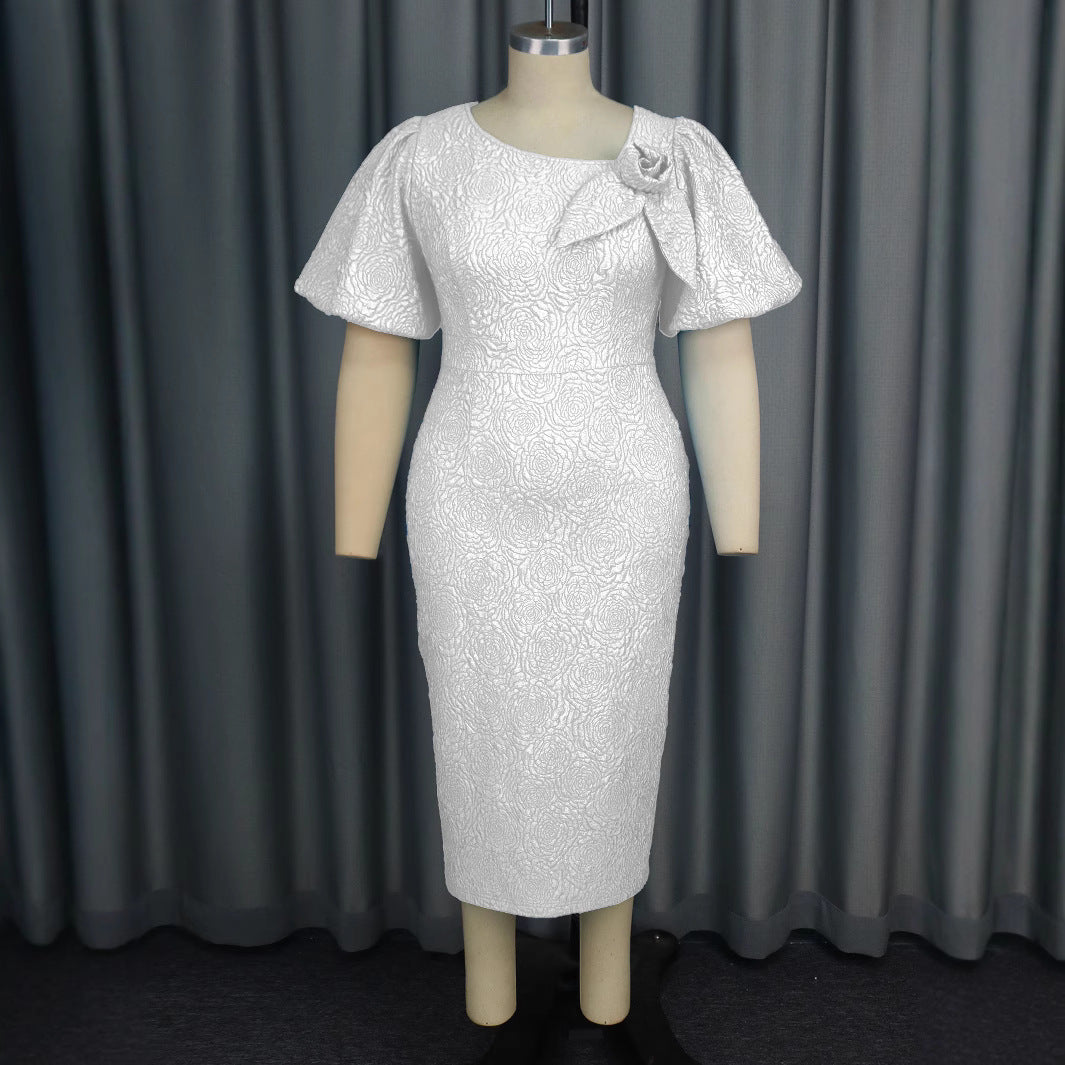 Figurbetontes Etuikleid für Damen, stilvoll, mit Blumenmuster und trendigen Puffärmeln.