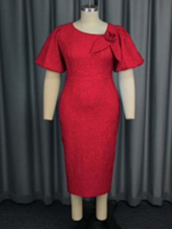 Stilvolles Damen Partykleid, figurbetont, mit trendigen Puffärmeln und Blumenapplikation.