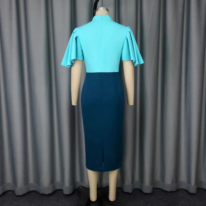 Stilvolles Damenkleid, figurbetont, mit schickem Stehkragen und trendigen Puffärmeln für elegante Abend-Events.