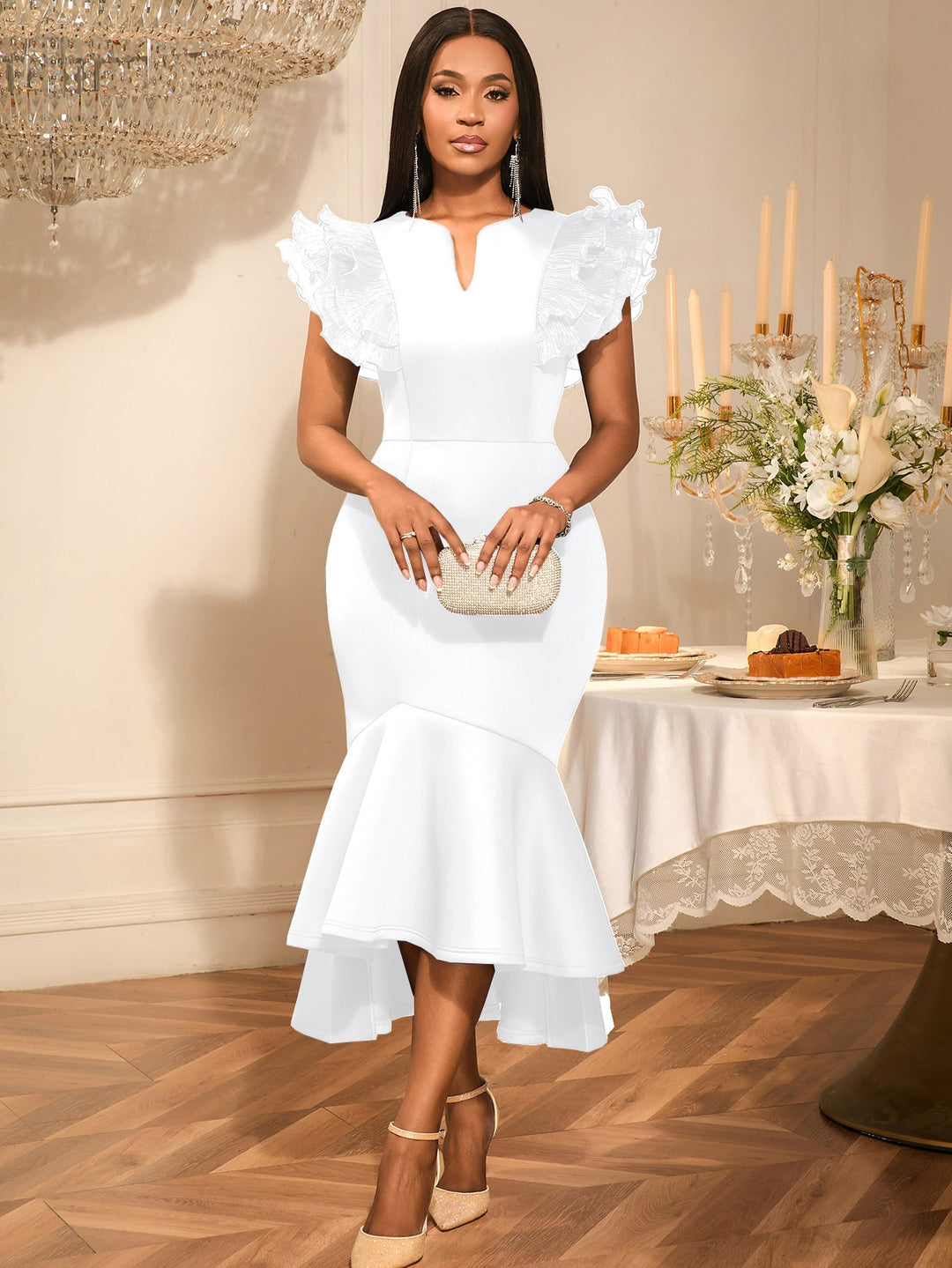 Festliches Damenkleid, eng anliegend, mit modischen Rüschenärmeln. Perfekt als Abend- oder Partykleid.