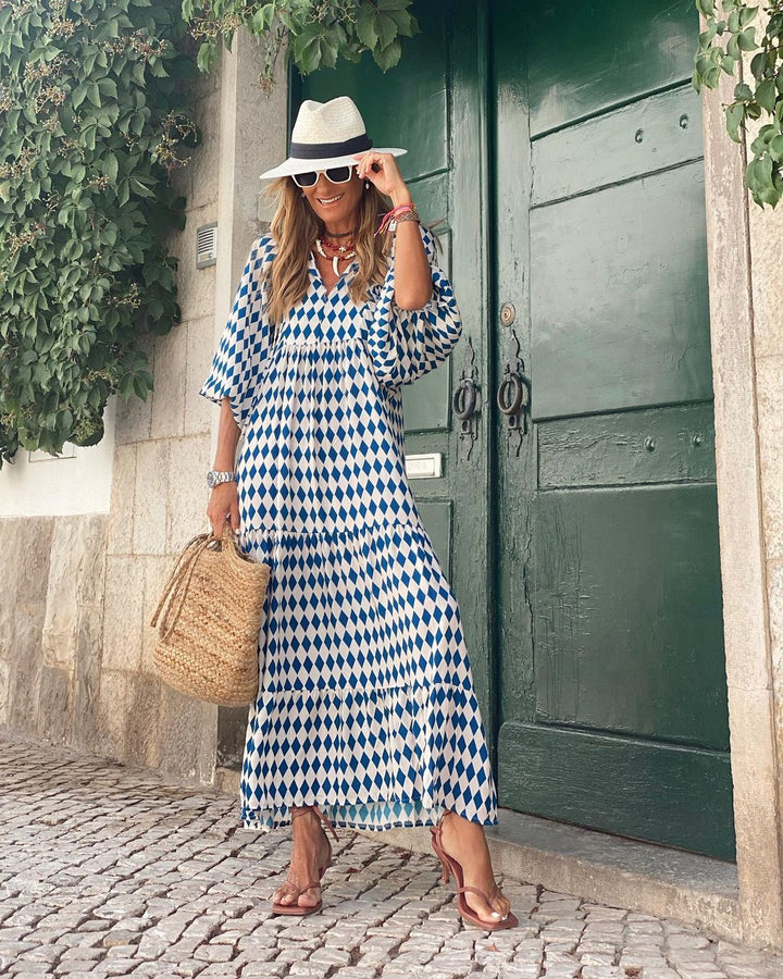 Damen Bohemian Maxikleid mit V-Ausschnitt für mühelosen Sommer-Stil. Ein luftiges, elegantes Urlaubskleid.