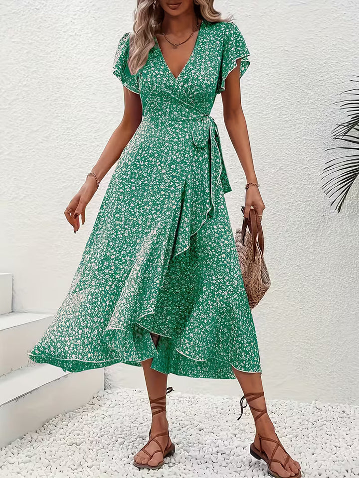 Gepunktetes fließendes Wickelkleid für Damen, bauchumspielend, perfekt als Sommer Maxikleid.