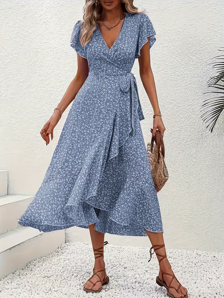 Langes Sommer Wickelkleid für Damen, schmeichelhaft mit V-Ausschnitt und fließendem Material.
