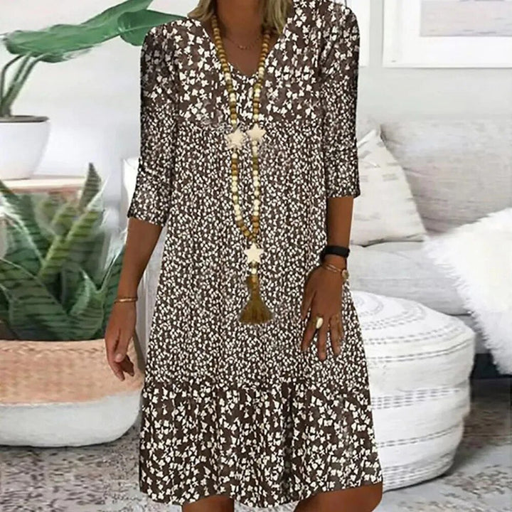 Damen Freizeitkleid mit lebhaftem Blumenmuster, ideal für Frühling und Sommer.