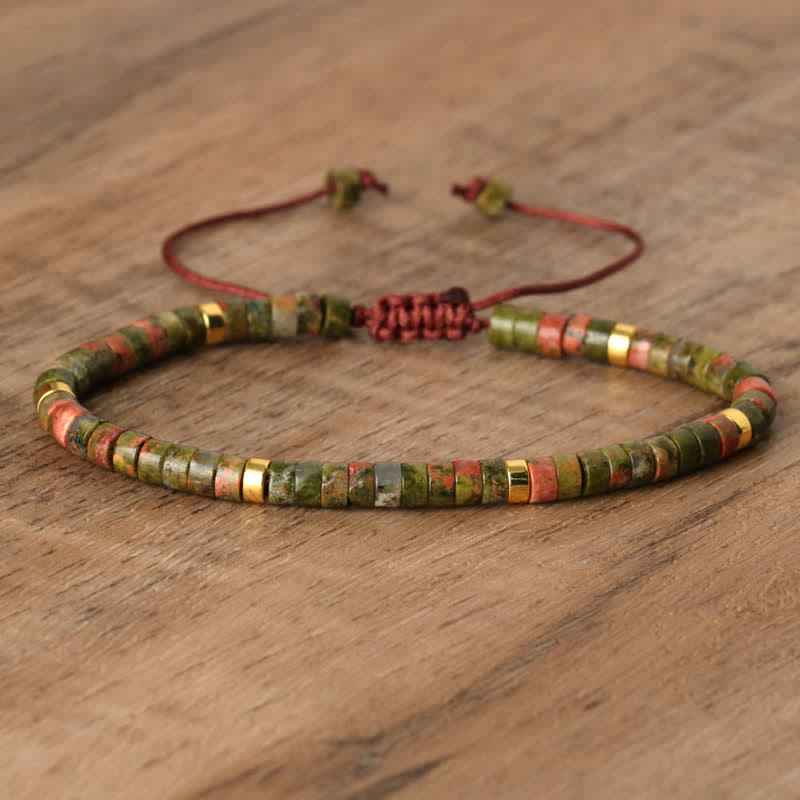 Verstellbares Damenarmband mit 2,4 mm Rhodonit Naturstein-Perlen, rosa-schwarz, geflochten.