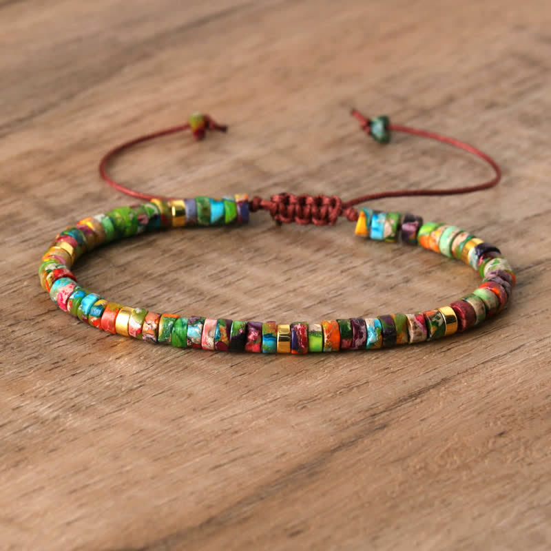 Verstellbares Damenarmband mit 2,4 mm Pietersit Naturstein-Perlen, blau-braun, geflochten.