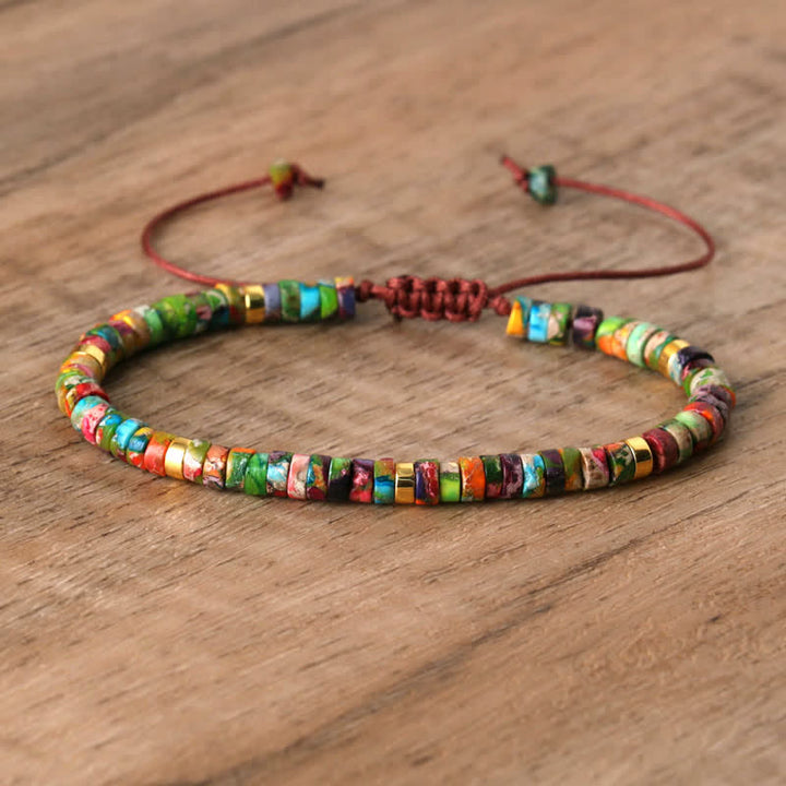 Verstellbares Damenarmband mit 2,4 mm Pietersit Naturstein-Perlen, blau-braun, geflochten.