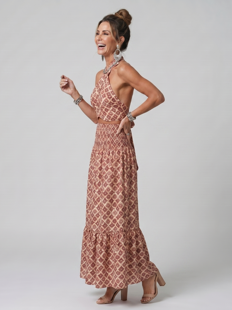 Elegantes Damen Midikleid mit geometrischem Muster, Cutout und Kreuzträgern; perfekt als Sommer-Freizeitkleid.