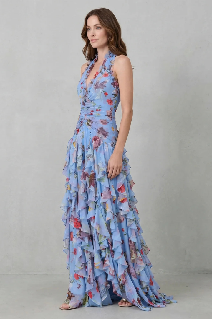 Damen Halter Abendkleid mit rückseitigen Details, Blumenprint & fließenden Kaskadenrüschen. Elegant und stilvoll.