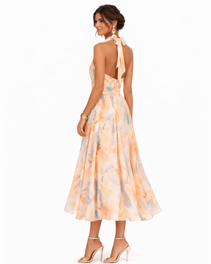 Schickes Damen Halter Neck Maxikleid, ganzflächig mit Aquarell-Druck. Optimal für elegante Sommerpartys.