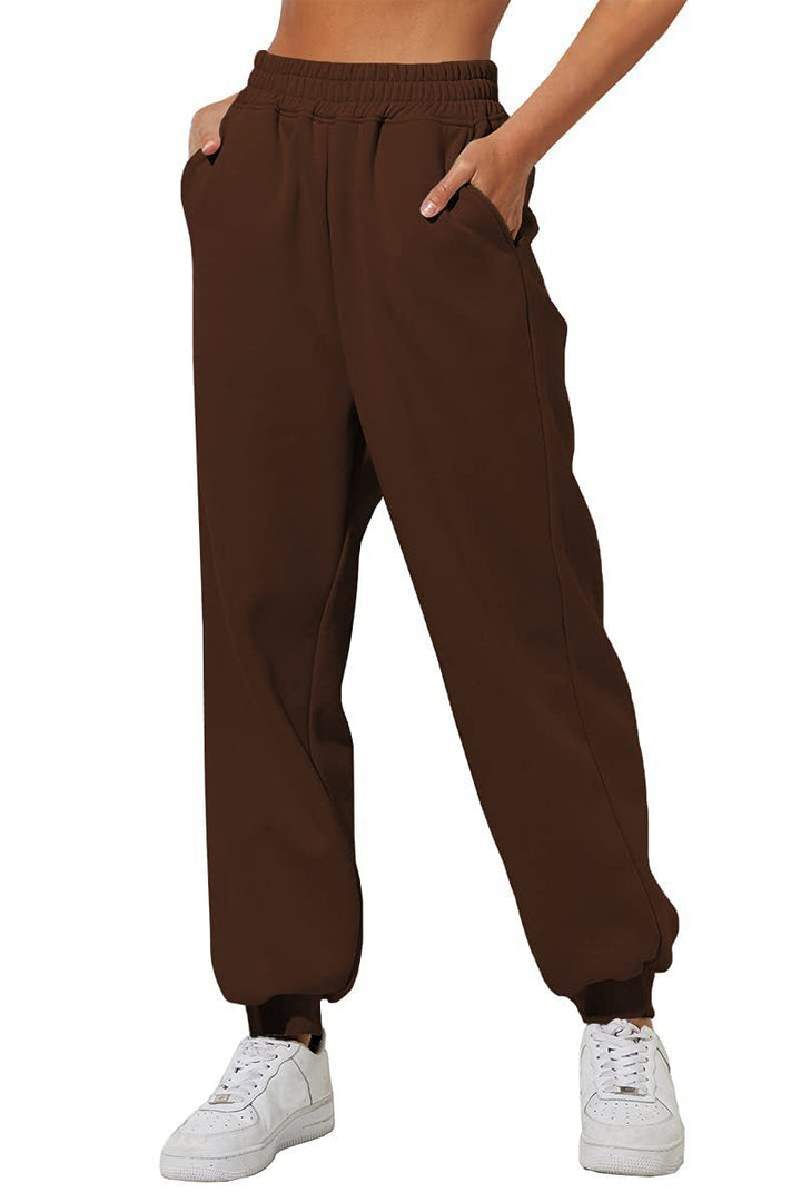 Damen High-Waist Jogginghose, Loose Fit, weicher Stoff, betont Komfort & lässige Eleganz.