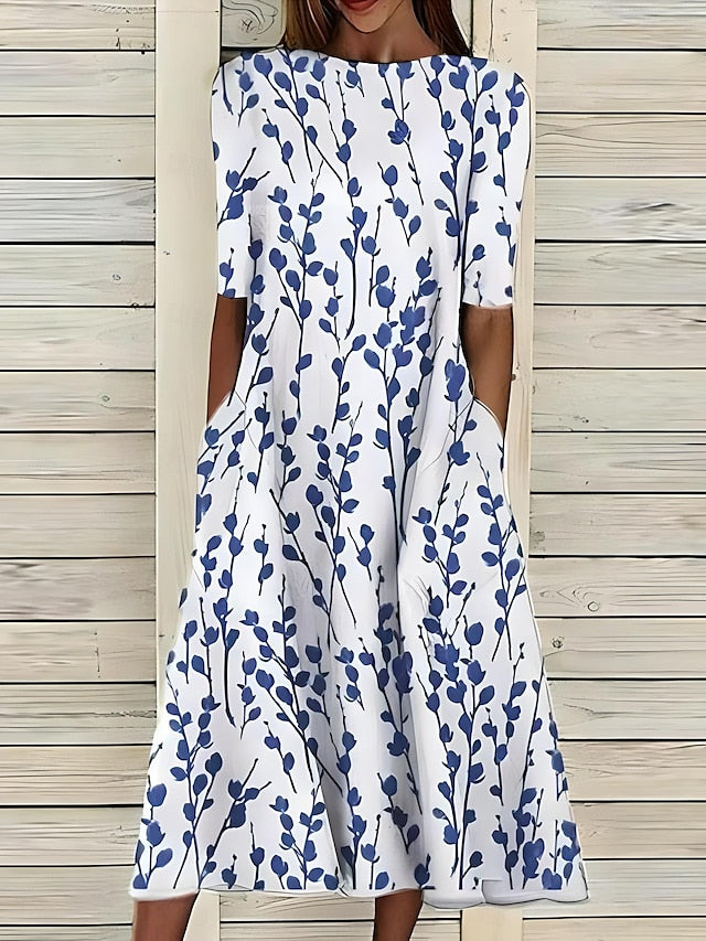 Leichtes, fließendes Damen Midi Sommerkleid mit Küstenblumen-Print, perfekt für heiße Tage und Freizeit.