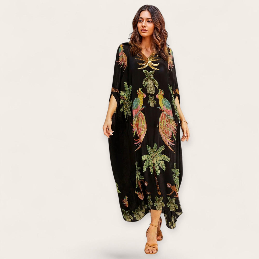 Lockerer Damen Kaftan mit V-Ausschnitt und tropischem Print. Bequemes Freizeitkleid, knöchellang für warme Tage.