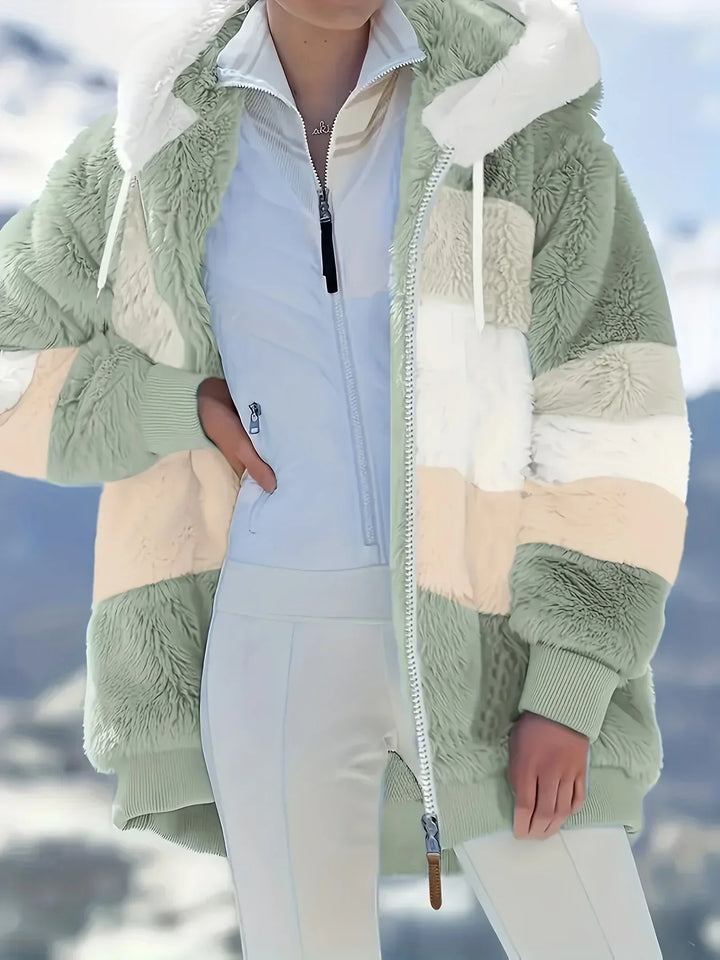 Stilvolle Damenbekleidung: Midlänge Kapuzenjacke, elegant & kuschelig für kalte Tage.