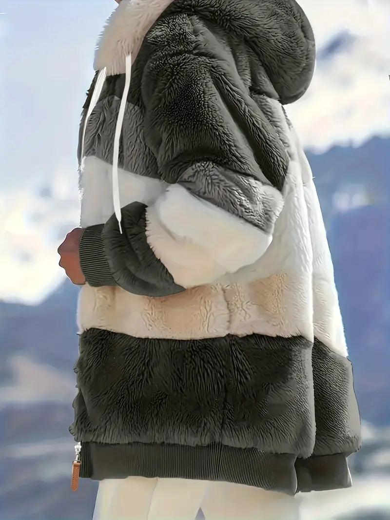 Warme Kapuzenjacke für Damen, Midlänge, perfekt als bequeme Winter- oder Freizeitjacke.