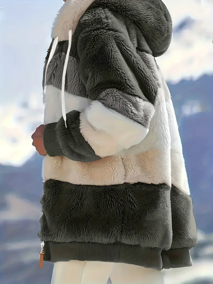 Warme Kapuzenjacke für Damen, Midlänge, perfekt als bequeme Winter- oder Freizeitjacke.