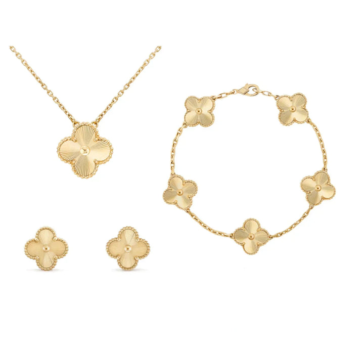Luxuriöses goldenes Kleeblatt Schmuckset Lyla für Damen mit Halskette, Armband und Ohrringen.