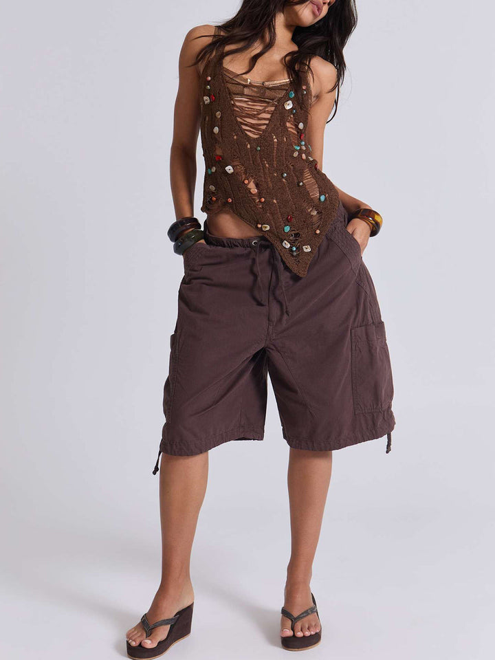 Detailaufnahme der Damen Cargo-Shorts: Reißverschluss, Knopfverschluss und Kordelzug am Bund für optimalen Sitz.