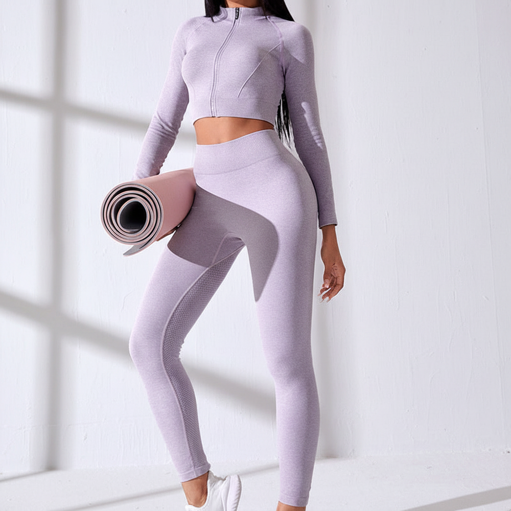 FitAura Damen Fitness Outfit: Langarm Crop Top Set mit Leggings für intensive Workouts.