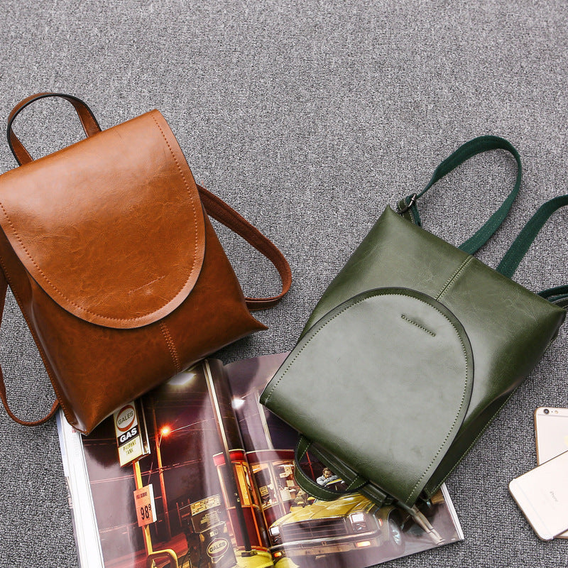 Chic Damen Leder Rucksack, schwarzgrün, perfekt für Business & Reisen.
