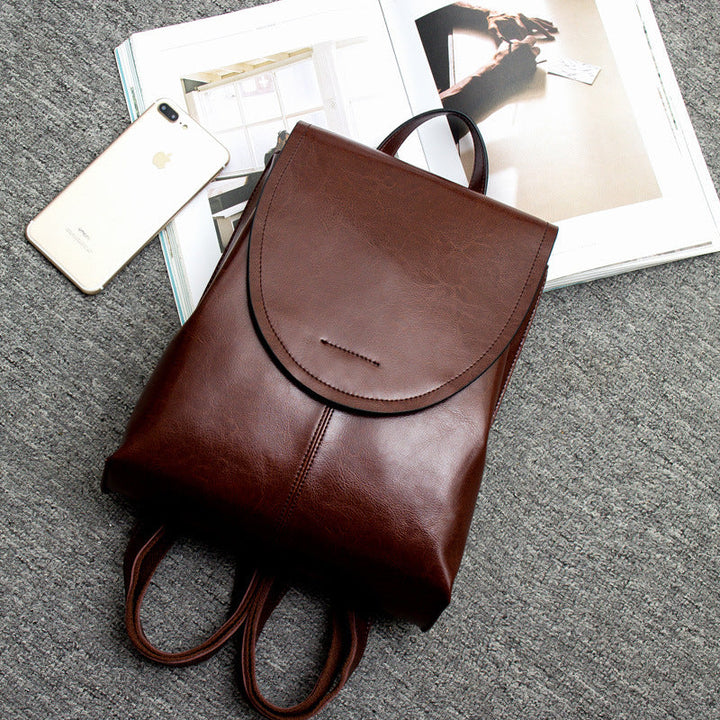 Klassischer Damen Rucksack aus Leder, kaffee, elegant & zeitlos.