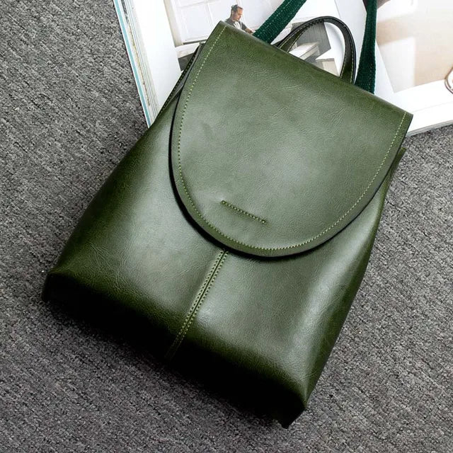 Eleganter Damen Rucksack aus Leder, schwarzgrün, stilvolles Accessoire.