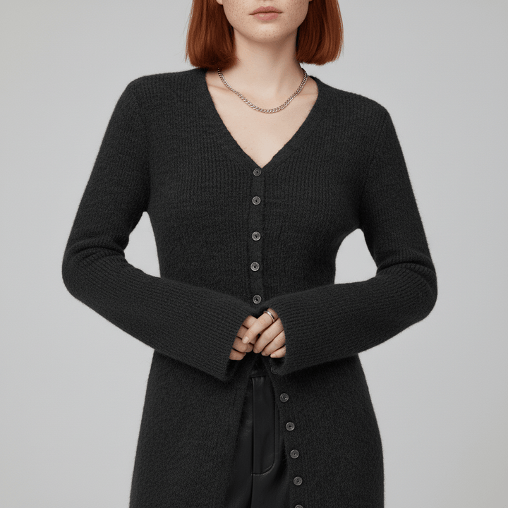 Modischer Damen Langarm-Cardigan mit durchgehender Knopfleiste. Vielseitig kombinierbarer Longline-Stil.