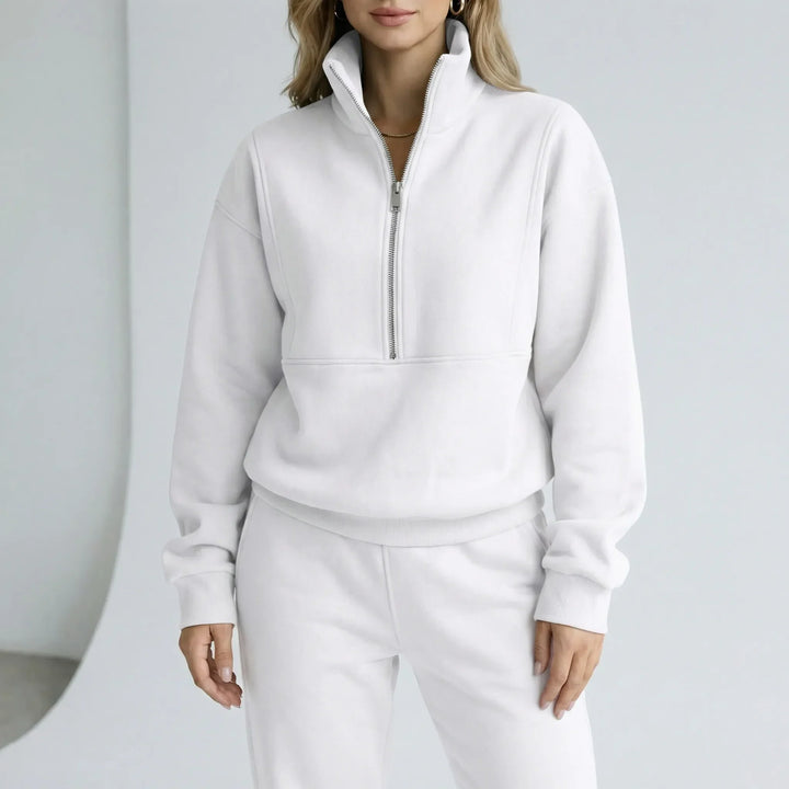 Stylisches & bequemes Damen Loungewear Set mit Halbzipper Oberteil und weiter Hose für jeden Tag.