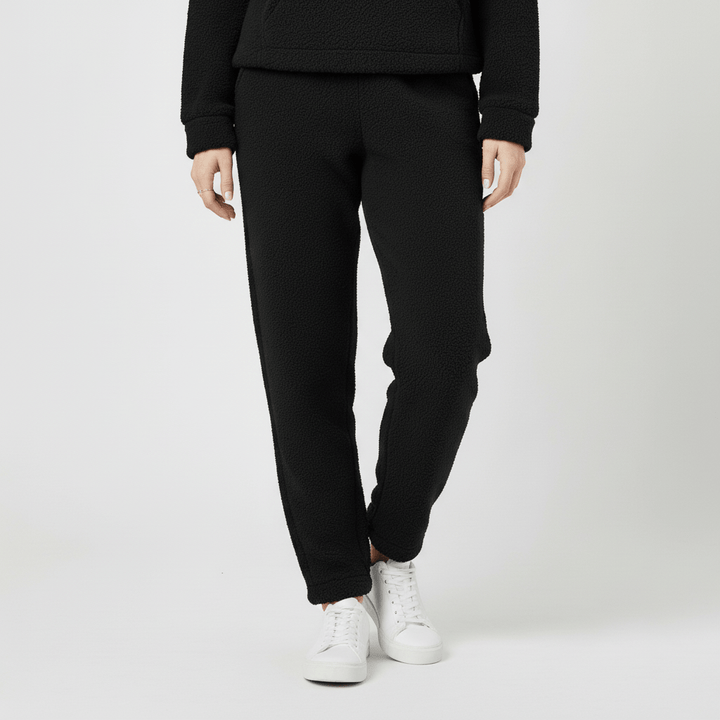 Moderner Freizeitanzug für Damen, bestehend aus Hoodie und Jogginghose, ideal für den Alltag.