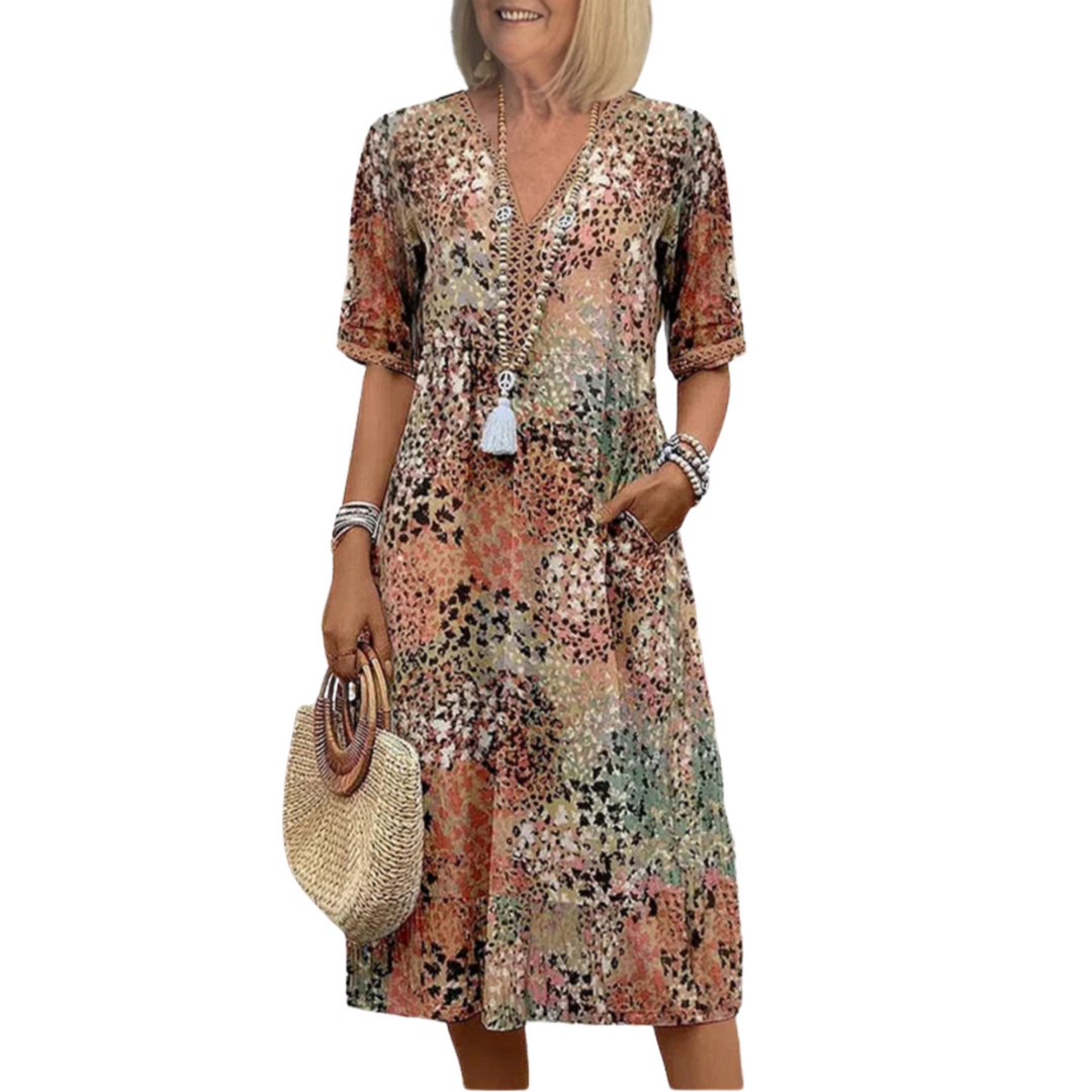 Damen Midi-Kleid mit V-Ausschnitt, lebendigen Prints. Bequemes Sommerkleid für Freizeit & Urlaub.