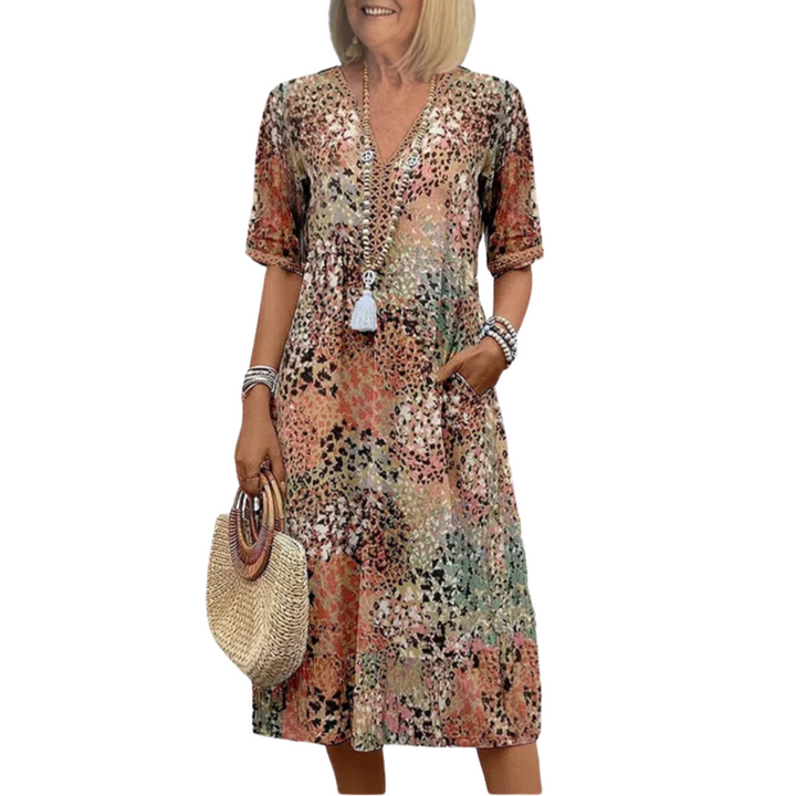 Damen Midi-Kleid mit V-Ausschnitt, lebendigen Prints. Bequemes Sommerkleid für Freizeit & Urlaub.