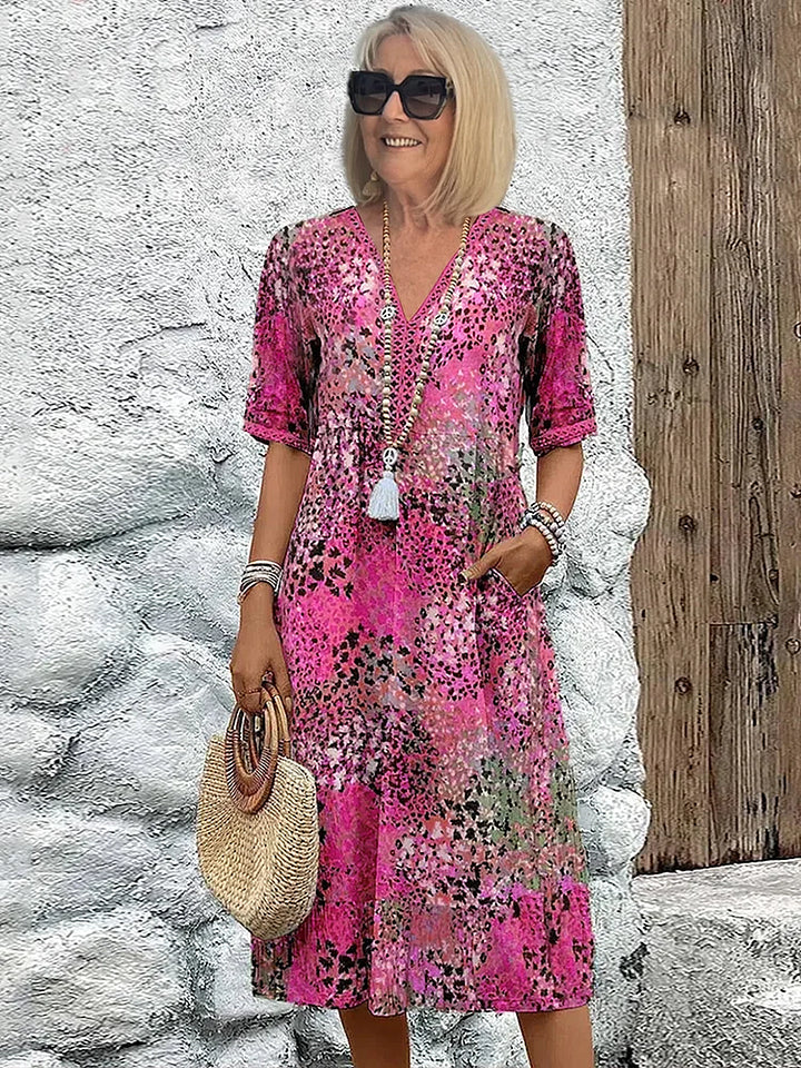 Vielseitiges Damen Midi-Kleid, V-Ausschnitt & Muster. Perfekt als Freizeit-, Urlaubs- oder elegantes Sommerkleid.