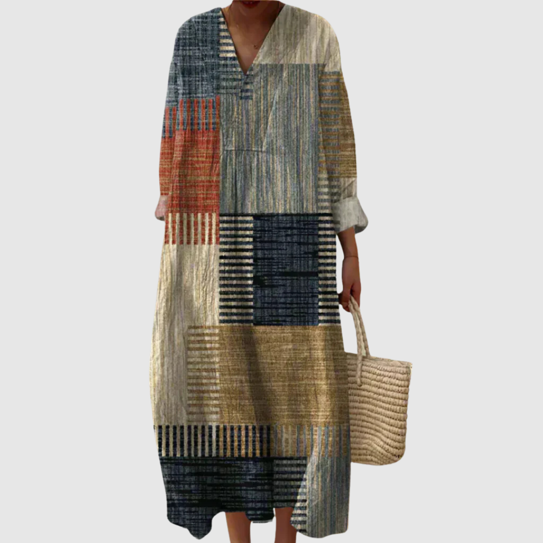 Damen Midikleid mit abstraktem Muster. Fließender Stoff für einen eleganten, sommerlichen Look von Nordheim.
