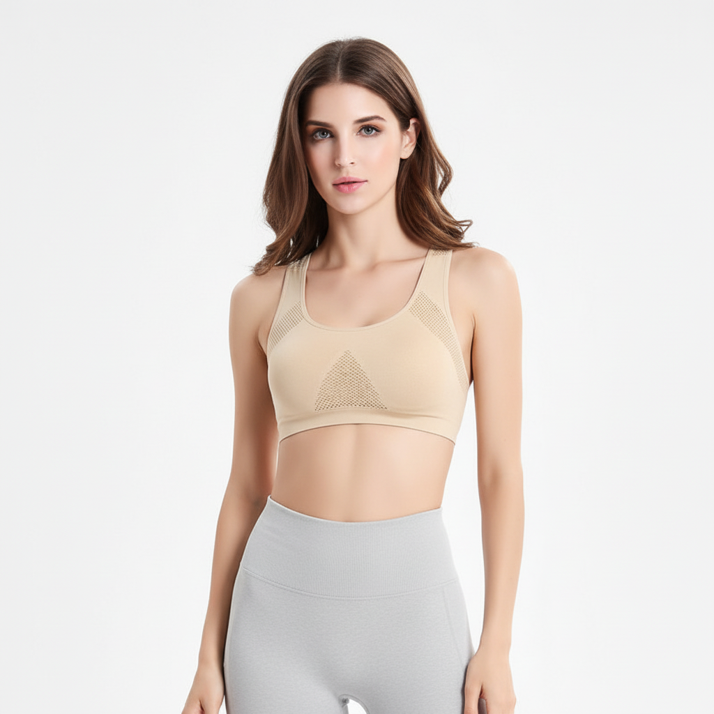Frau trägt nahtlosen Damen Sport BH Kelsey, hoher Halt, komfortabel für Fitness und Activewear.