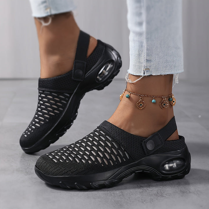 Paar Damen Orthopädische Clogs, Frontansicht, Komfortschuhe mit Luftpolsterung für Arbeits- und Freizeit.
