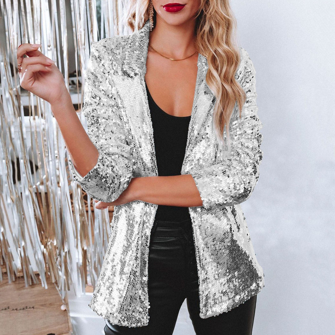 Damen Pailletten-Blazer auf einem Bügel, präsentiert als vielseitige Jacke für Abendmode und schicke Outfits.
