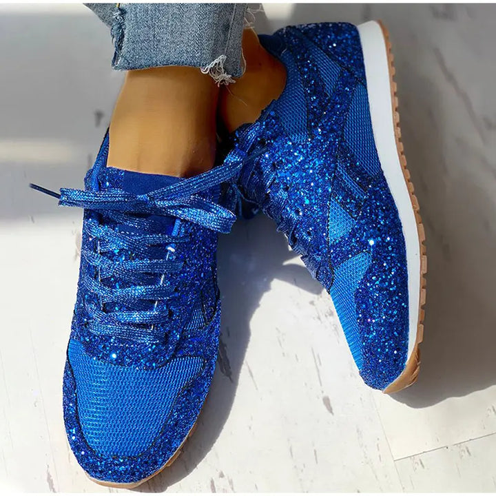 Modische Freizeitschuhe: Damen Sneaker mit schimmernden Pailletten. Ein Blickfang für stilbewusste Frauen.