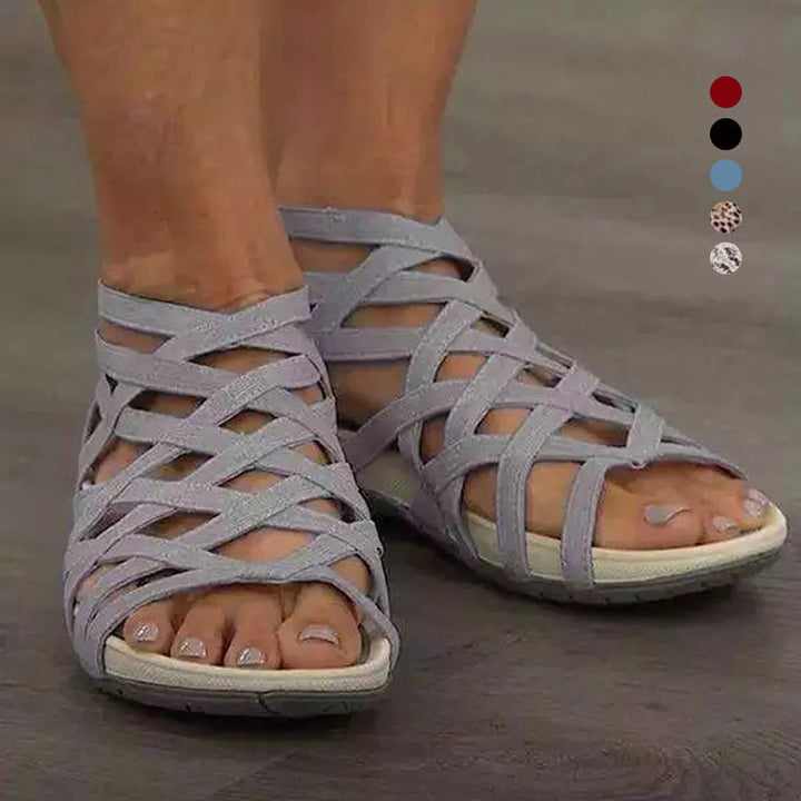 Damen Römersandalen in Schwarz für mühelosen Stil. Bequeme flache Sommerschuhe für Alltag & Urlaub.