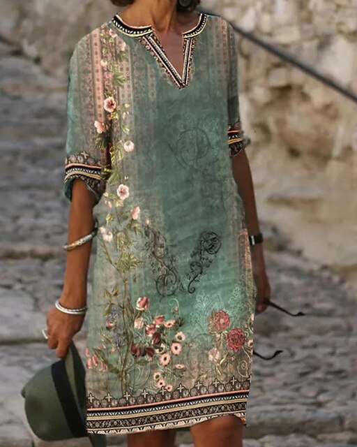 Damen Retro-Minikleid mit elegantem Blumendruck. Perfekt als Sommer- oder Freizeitkleid mit V-Ausschnitt.