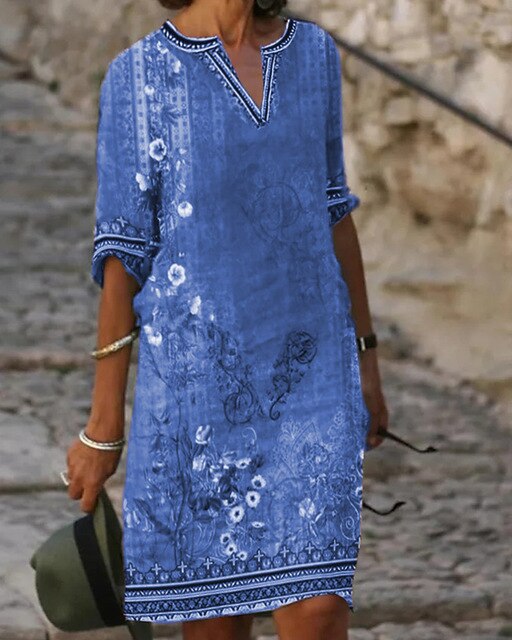 Retro-Minikleid für Damen, kurzärmlig mit Blumenmuster und V-Ausschnitt. Optimal für Freizeit und Frühling.
