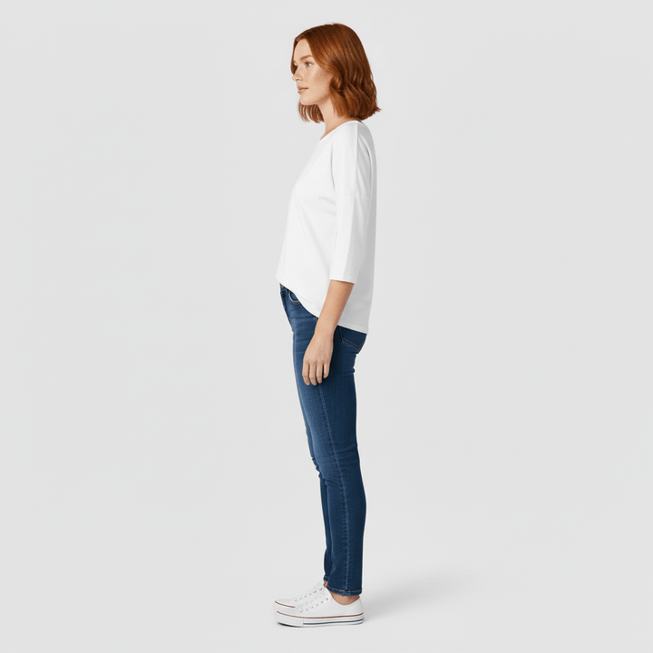 Stylisches Damenshirt mit Rundhals-Ausschnitt und Dreiviertelärmeln; vielseitig kombinierbar.