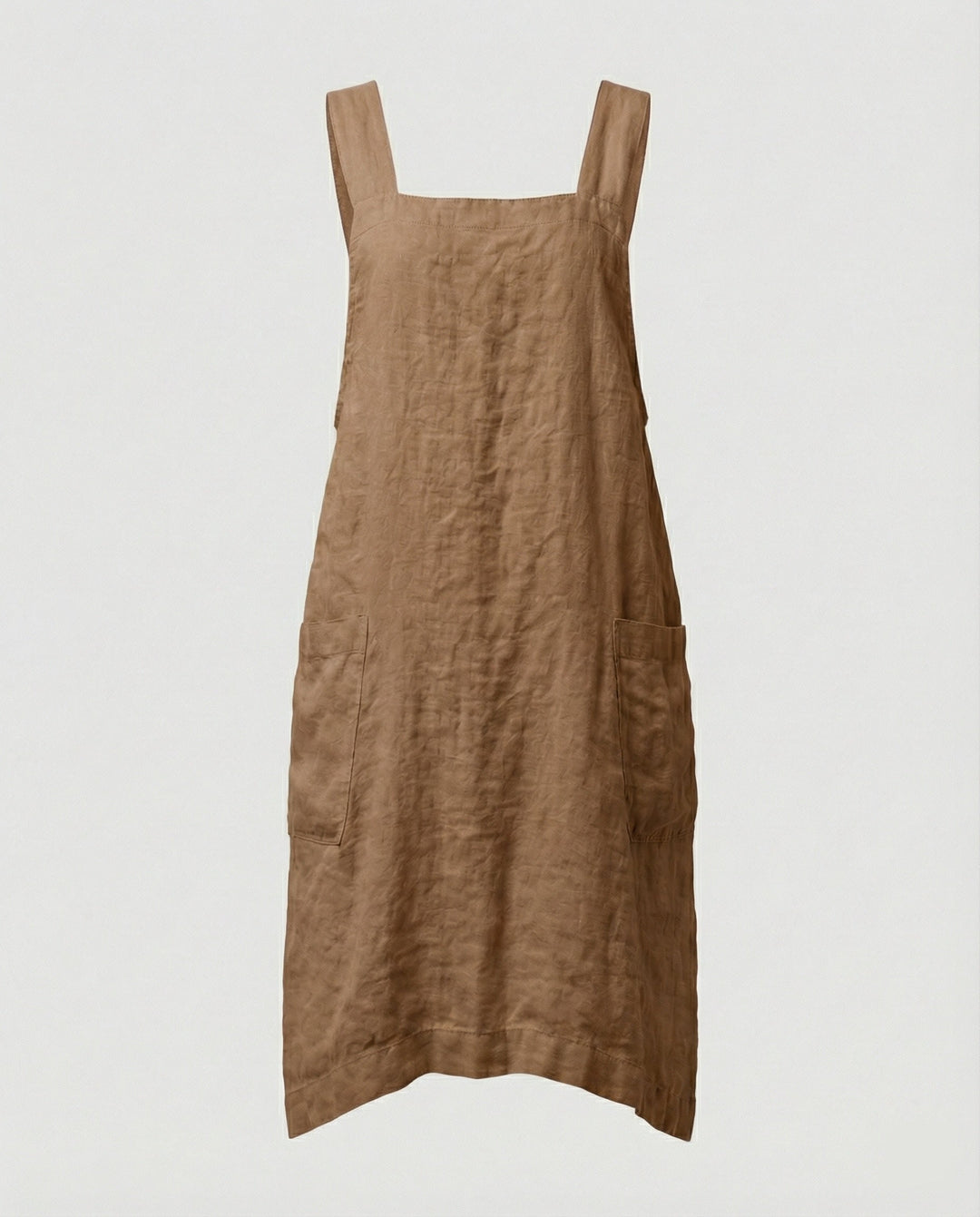 Modell trägt bequemes, lockeres Damen Schürzenkleid mit Taschen für Alltag und Freizeit.