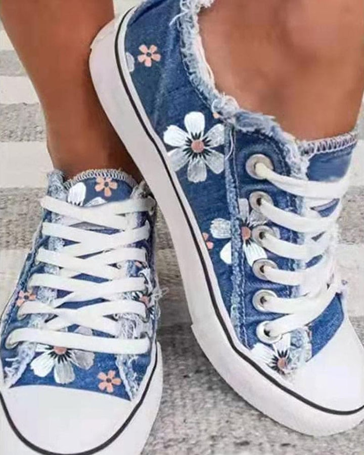 Damen Sneaker mit blumigem Muster, ideal für Frühling & Sommer. Stilvolle & bequeme Freizeitschuhe für den Alltag.