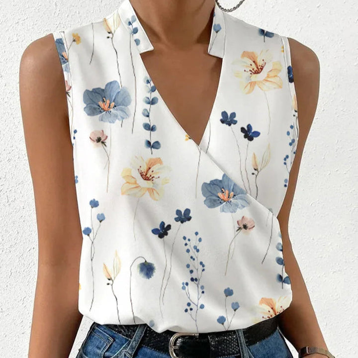 Leichtes, atmungsaktives Damen Sommer Top mit zartem Blumenmuster, perfekt für Freizeit & Urlaub. Komfortables ärmelloses Oberteil.